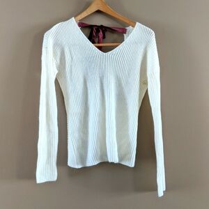 Soft cream rue 21 sweater with velvet bow cross back cute detailing